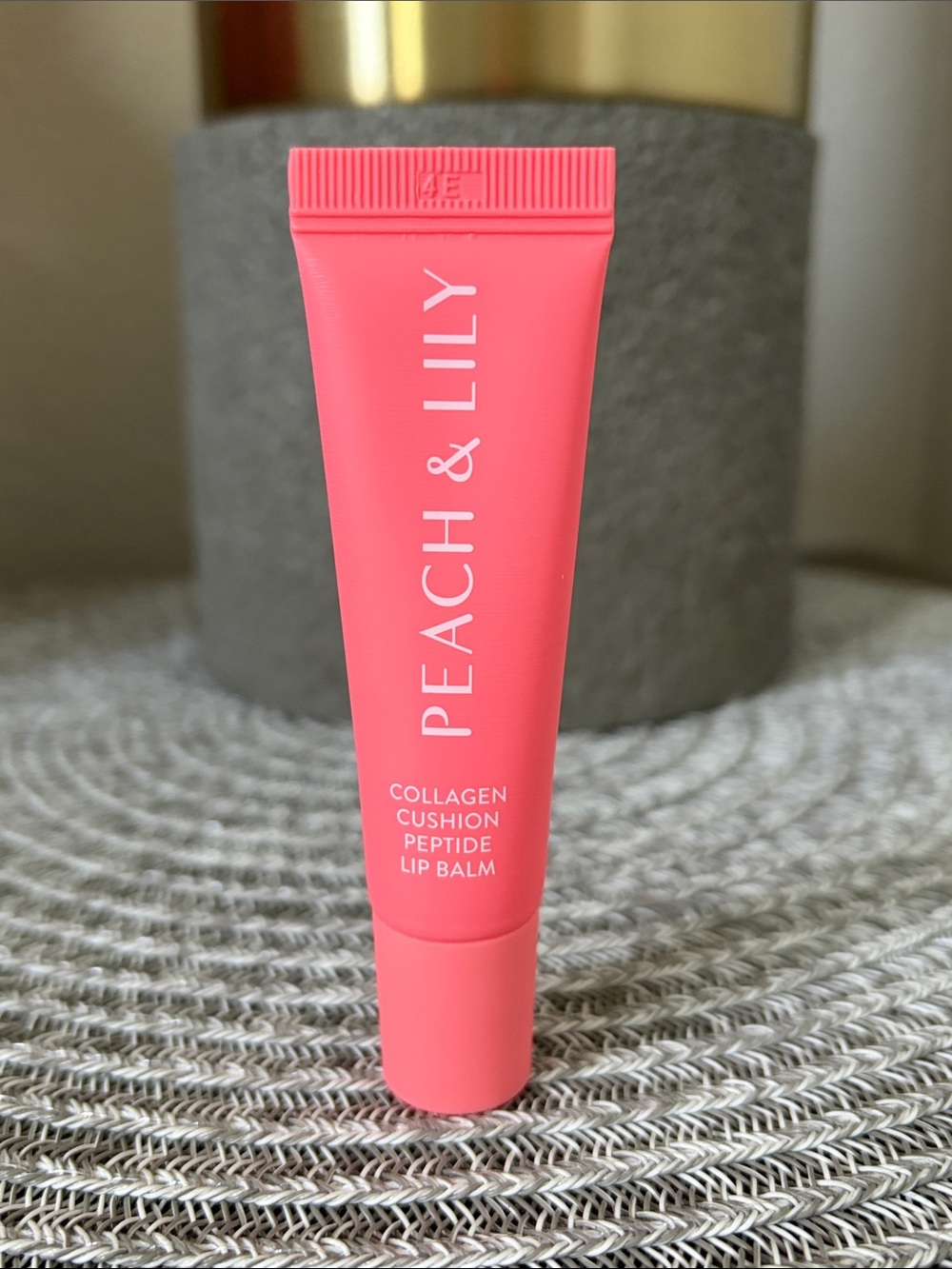 â¤ď¸$15 NWT Peach & Lily Collagen Cushion Peptide Lip Balm in Sheer Peach 12ml